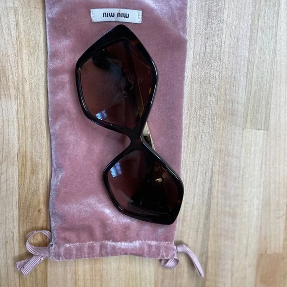 Brown Tortoise Miu Miu Sunglasses Octagon Shaped Miu Miu 0MU 04ZS Sunglasses 19P2Z1 Tortoise - eye-oo.com main image 2